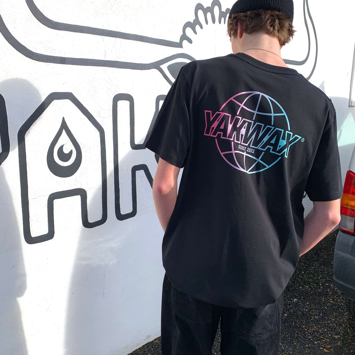 Yakwax Worldwide T-Shirt - Black/Slushie - Mens Graphic T-Shirt by Yakwax